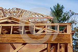 New build roof with wooden home construction framing Timber frame house, real estate.