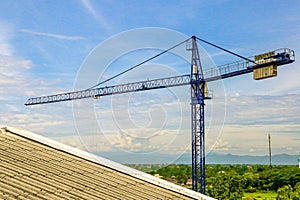 A New building is being constructed with use of tower crane