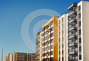 New building, economy class residential building against the blue sky,  Russia