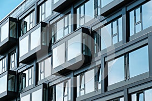 New building facade , windows on apartment house exterior