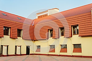 New building with red tiled roof