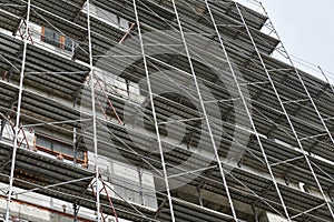 New building under construction, scaffolding and concrete