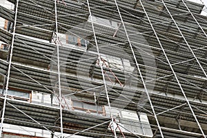 New building under construction, scaffolding and concrete