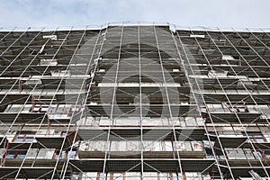 New building under construction, scaffolding and concrete