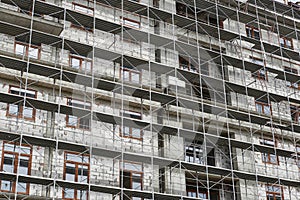 New building under construction, scaffolding and concrete