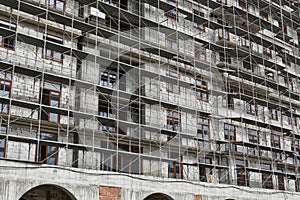 New building under construction, scaffolding and concrete