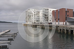 New buildings on quays at harbor, Harstad, Norway