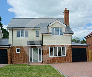 New builds, empty, detached family house. Brick & weatherboard.