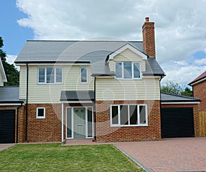 New builds, empty, detached family house. Brick & weatherboard. photo