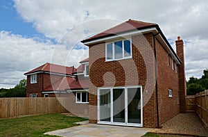 New builds, empty, detached family house. Rear view