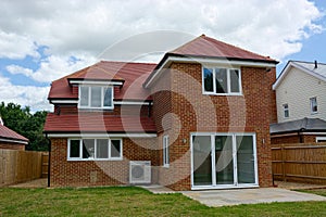 New builds, empty, detached family house. Rear view