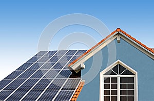 New built house, rooftop with solar cells photo