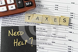 New Canadian personal tax forms and letter tiles showing refunds and taxes