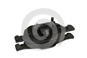 New car brake pads isolated on white. Set of spare brake pads for one wheel
