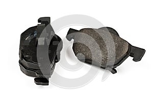 New car brake pads isolated on white. Set of spare brake pads for one wheel