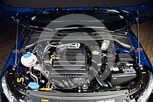 New car engine and parts under hood