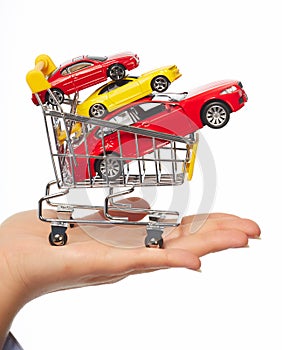 New car in shopping cart.