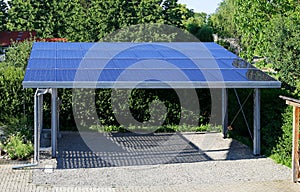 New carport with semi transparent photovoltaik moduls photo