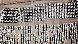 New cars covered in protective white sheets