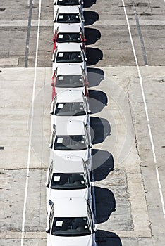 New cars ready for shipment at the port of Barcelona