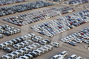 New cars in rows stored at port Rashid in Dubai, UAE