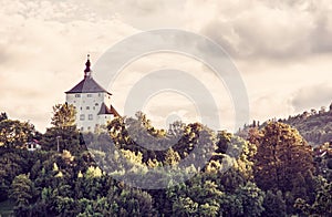 New Castle with forest in sunset, Banska Stiavnica, red filter