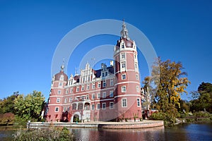 New Castle and moat in the park Muskauer