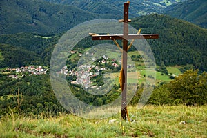 New christian cross on the Temes rock above the village Temes under the rock, Slovakia