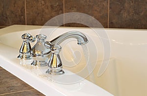 New Chrome Faucet in Master Bath Tub