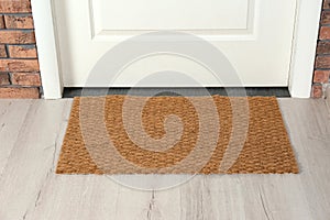 New mat near entrance door. Household item photo