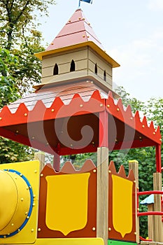 New colorful castle playhouse on children`s playground