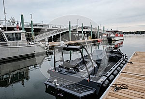 New concept fishing power boat seen in a calm Salem harbour moored up for the day.