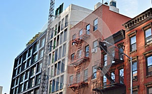 New Condo Development Bowery Street New York City Gentrification of Old Neighborhood Immigrant Tenement Apartments