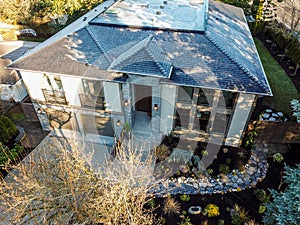 New construction home exterior with elegant stone porch