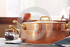 New copper cookware for professional kitchen close up