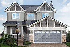 New cottage with garage on first floor.