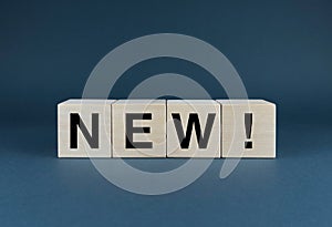 New. Cubes form the word New. The extensive concept of the word New