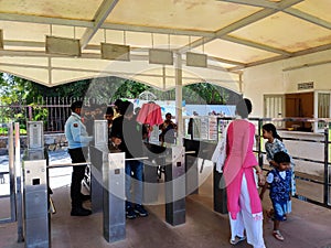 Group of People passing through a security counter during their travel and tourism activity.