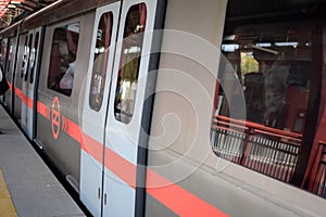 New Delhi India, August 10 2023 - Delhi Metro train arriving at Jhandewalan metro station in New Delhi, India, Asia, Public