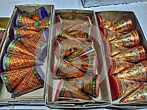 Boxes of various conical flower pot. People use to light beautiful firecracker- Anaar during Diwali and new year celebration.
