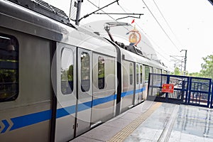 New Delhi India â€“ June 21 2022 - Delhi Metro train arriving at Jhandewalan metro station in New Delhi, India
