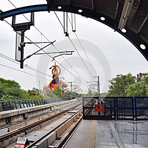 New Delhi India â€“ June 21 2022 - Delhi Metro train arriving at Jhandewalan metro station in New Delhi, India, Asia