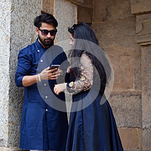 New Delhi India â€“ November 25 2019 : A couple pose for Pre Wedding shoot inside Lodhi Garden Delhi, a popular tourist landmark