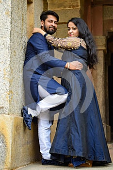 New Delhi India â€“ November 25 2019 : A couple pose for Pre Wedding shoot inside Lodhi Garden Delhi, a popular tourist landmark