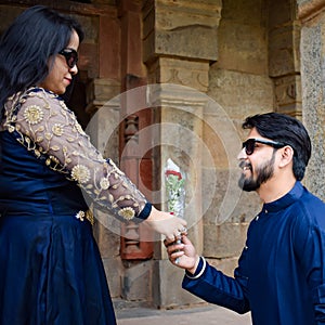 New Delhi India â€“ November 25 2020 : A couple pose for Pre Wedding shoot inside Lodhi Garden Delhi, a popular tourist landmark