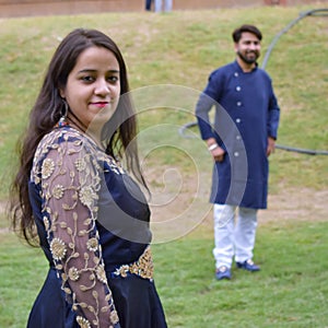 New Delhi India â€“ November 25 2020 : A couple pose for Pre Wedding shoot inside Lodhi Garden Delhi, a popular tourist landmark