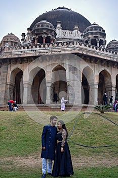 New Delhi India â€“ November 25 2020 : A couple pose for Pre Wedding shoot inside Lodhi Garden Delhi, a popular tourist landmark