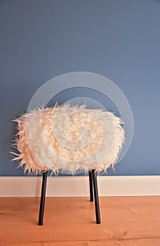 New designed, stylish stool made from white eco fur