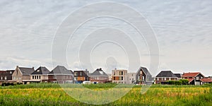 Dutch family houses on a vinex location in Almere Oosterwold, The Netherlands photo