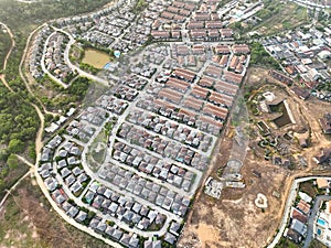 New development real estate. Aerial view of residential houses and driveways neighborhood